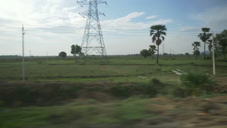 view of rural india landscape from the side window of the car, gaya, bihar, india