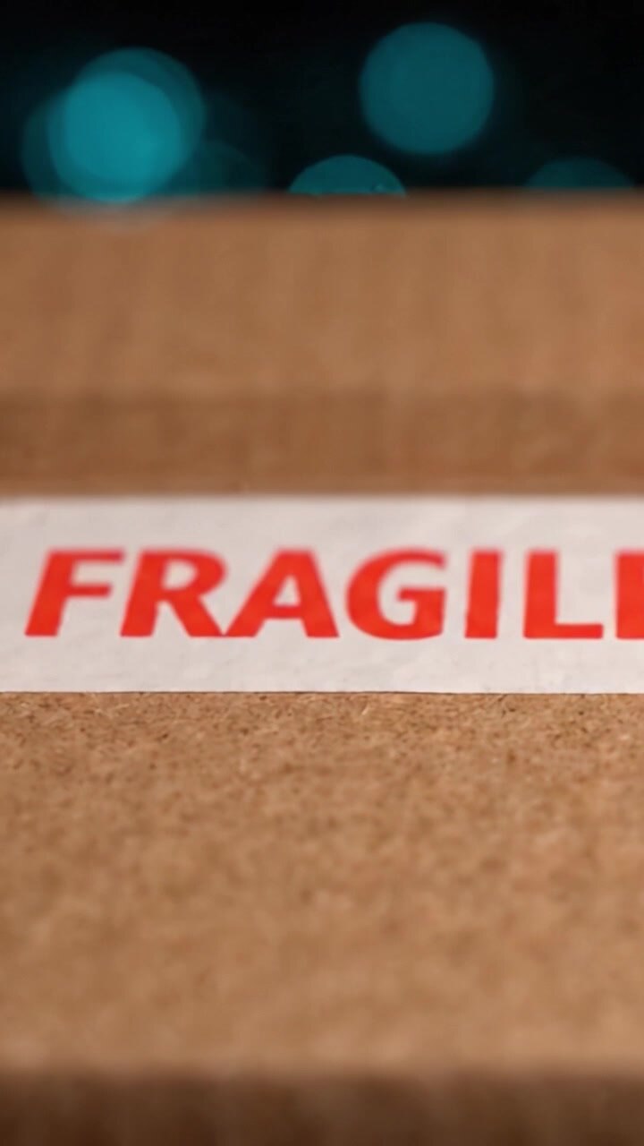 A Close-Up of a Delivered Package Marked as Fragile, Highlighting the Care Needed in Handling and the Importance of Proper Labeling in Package Delivery.