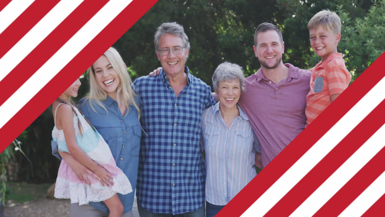 미소 짓는 백인 가족 위에서 흔들리는 미국 국기의 애니메이션