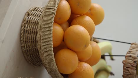 oranges and bananas in a wicker basket