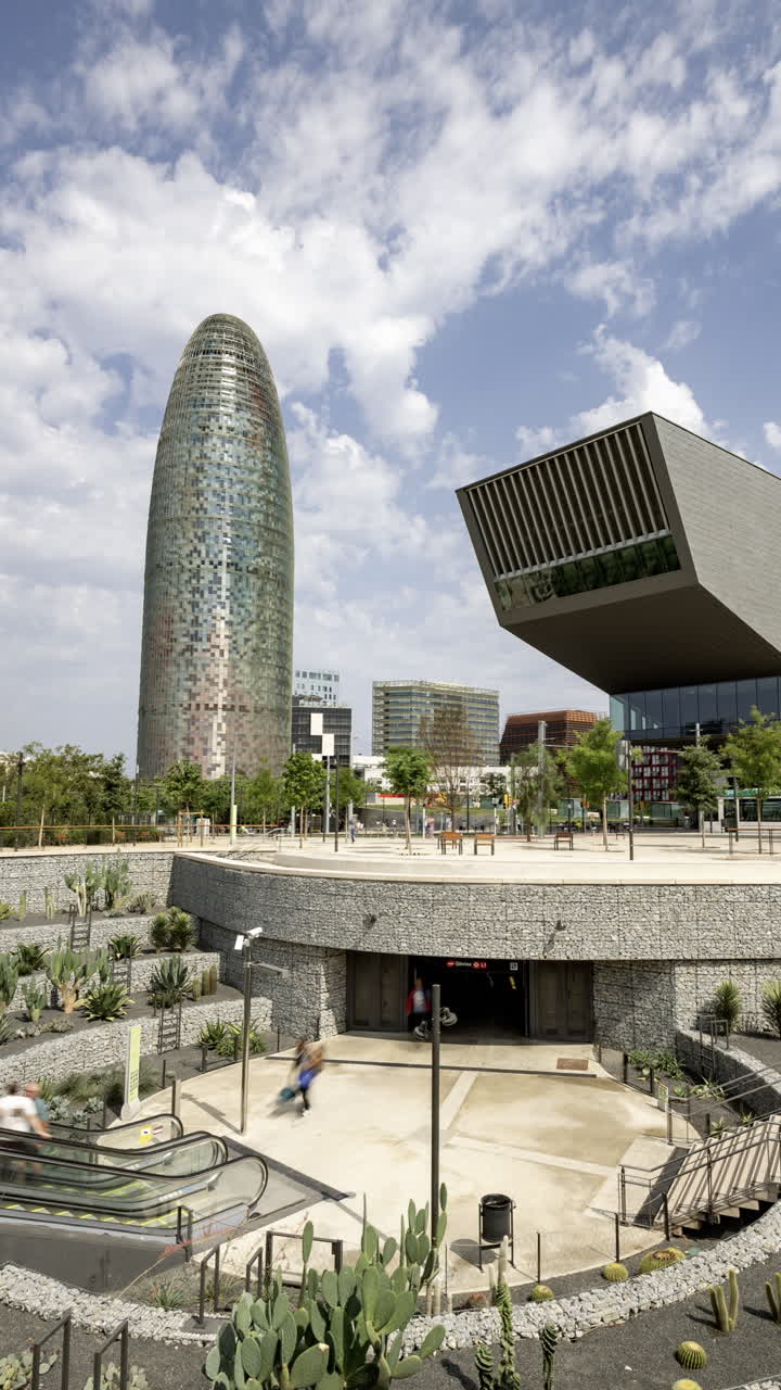 Timelapse of Glories Metro Station In Barcelona and skyline in vertical