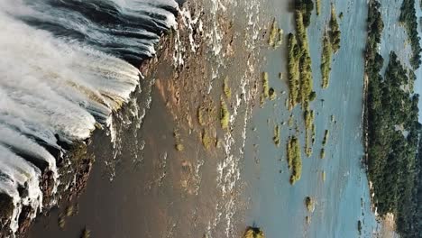 Vertical-Aerial-View-Victoria-Falls,-Shungu-Namutitima-at-the-Border-of-Zimbabwe-and-Zambia-in-Africa