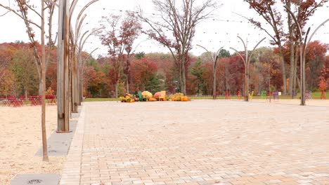 Fall-pumpkin-display-in-an-urban-park-in-Altoona,-Wisconsin