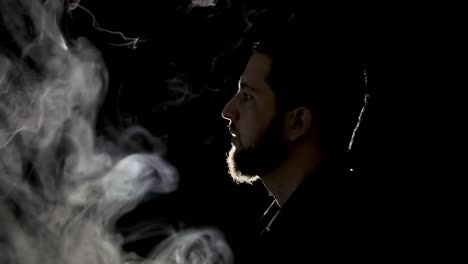 smoke involving man on black background