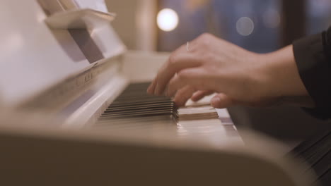 close up of a female hands playing piano 1