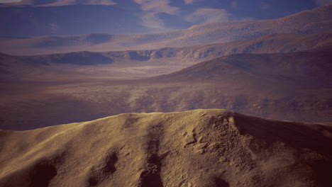 expansive desert landscape under a clear sky during golden hour