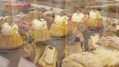 close up on pastry showcase, delicious cakes and bakery montpellier france