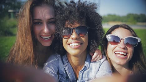 beautiful women posing at camera outside