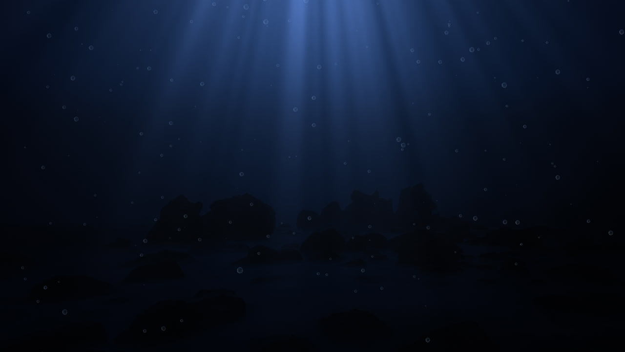 Dark blue ocean bottom with bubbles and light rays deep underwater