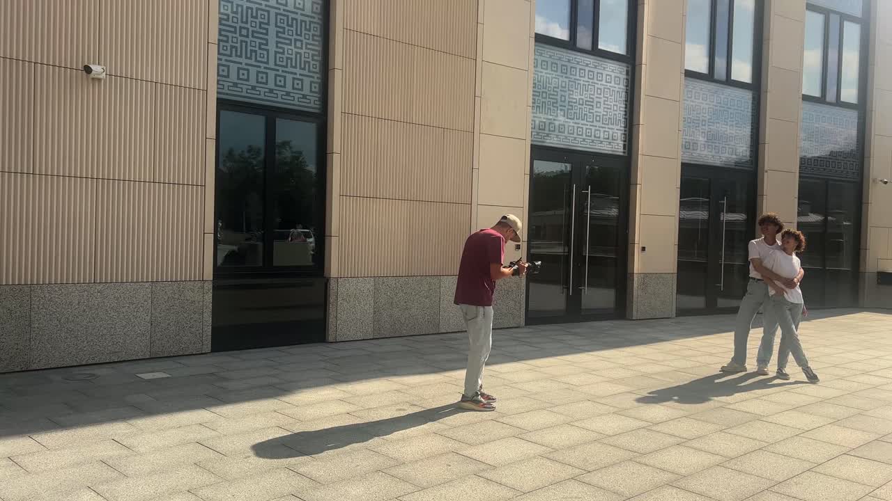 People Photographing near a Building
