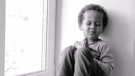 little boy praying to god with hands together on white background with people stock video stock footage