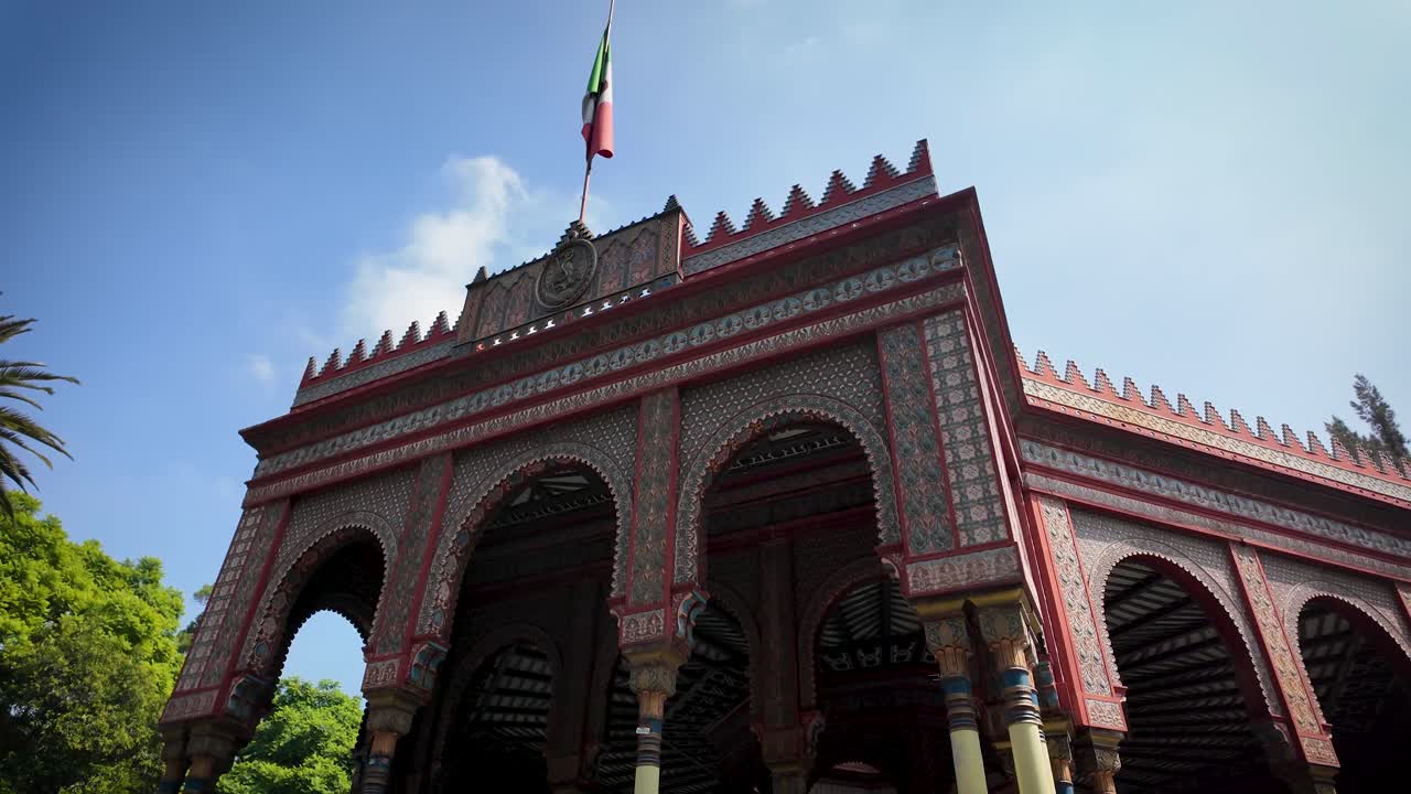 Detail shot of the Mexican flag located at the central part of the main entrance of the Moorish Kiosk in Mexico City