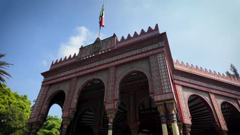 detail shot of the mexican flag located at the central part of the main entrance of the moorish kiosk in mexico city