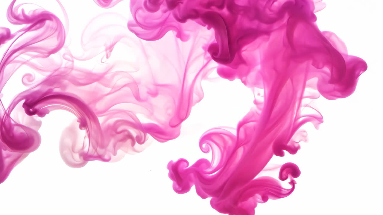 Colorful Pink Ink Swirls Across White Background Creating Abstract Art. Dynamic pink ink swirls blend and disperse artistically against a white backdrop.