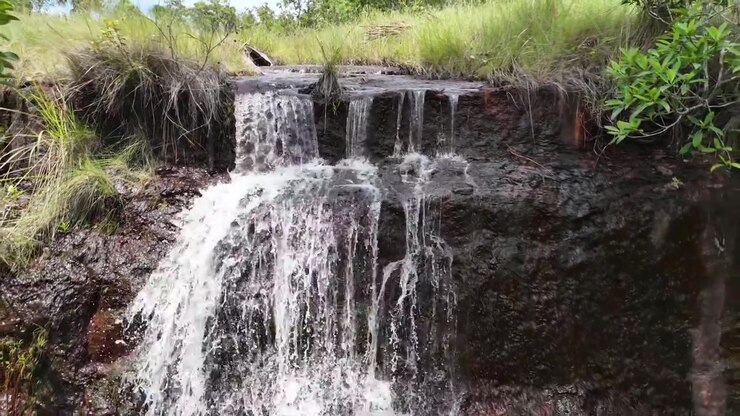 Secluded Tropical Landscape, Remote Waterfall, Clear Freshwaters, Savanna Brazil, Aerial Close-up View