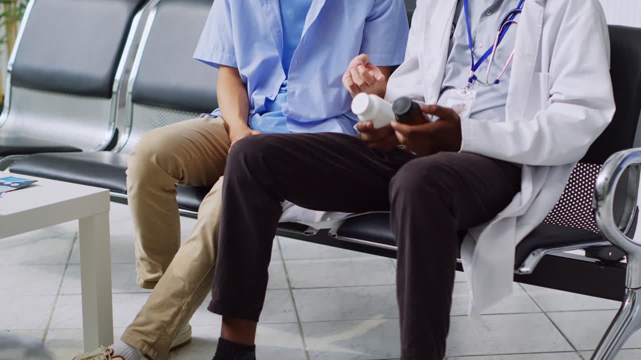 Doctor consulting with patient in waiting room