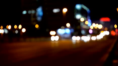 luces desenfocadas calle de los ángeles resumen. fondo borroso de la ciudad. círculos de bokeh en movimiento del tráfico nocturno.