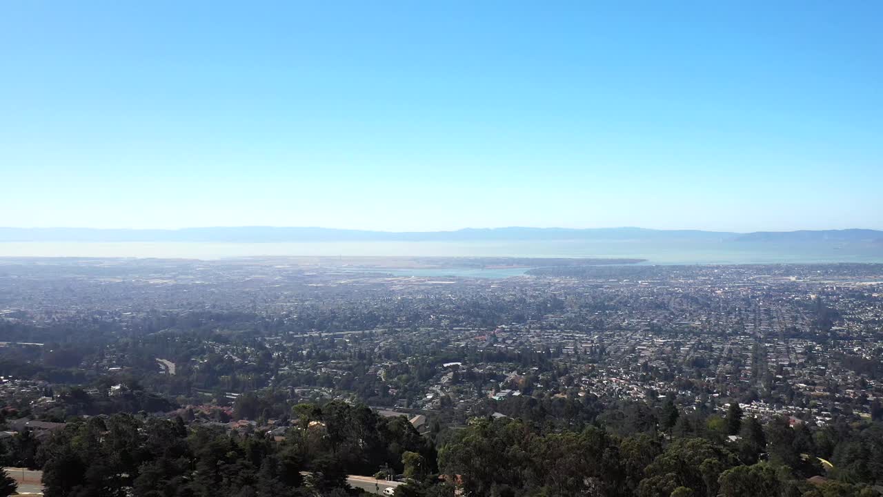 Aerial View of a Cityscape near a Bay