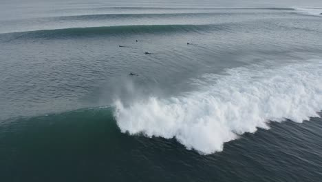 Fearless-surfer-hits-big-wave-in-Iceland-and-gets-wiped-out-by-whitewash,-aerial