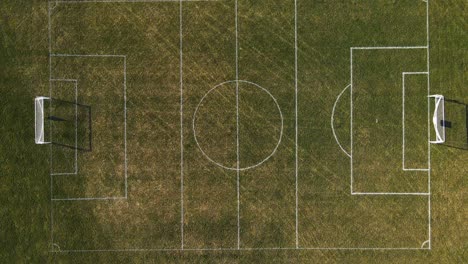 Aerial-view-of-green-football,-soccer-pitch