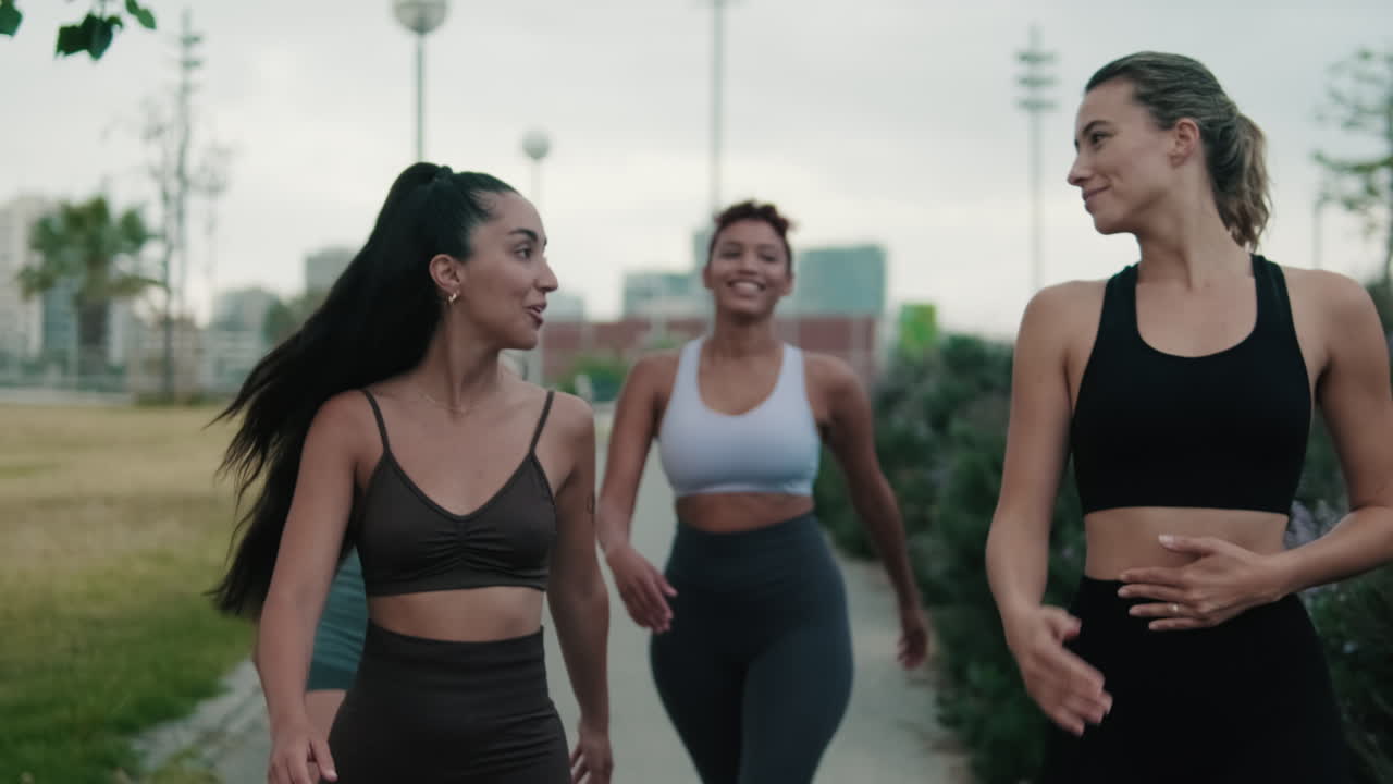 Four Female Friends Enjoying Fitness in the Park