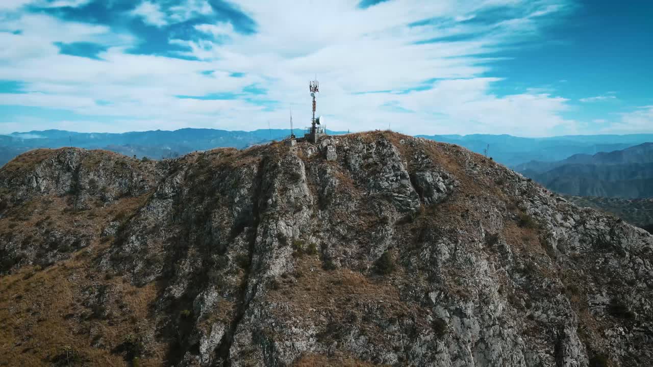Aerial View of a Telecommunication Tower on a Mountain Peak