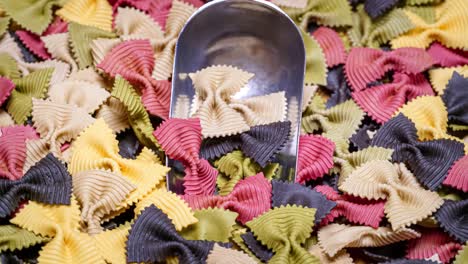 colored farfalle pasta bow tie pasta background.