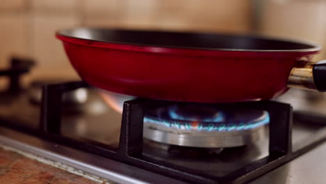 gas, stove and cooking with a pan on a plate