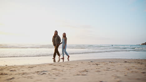 beach, walking and mother holding hands with child