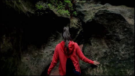 woman explore cave or cavern alone