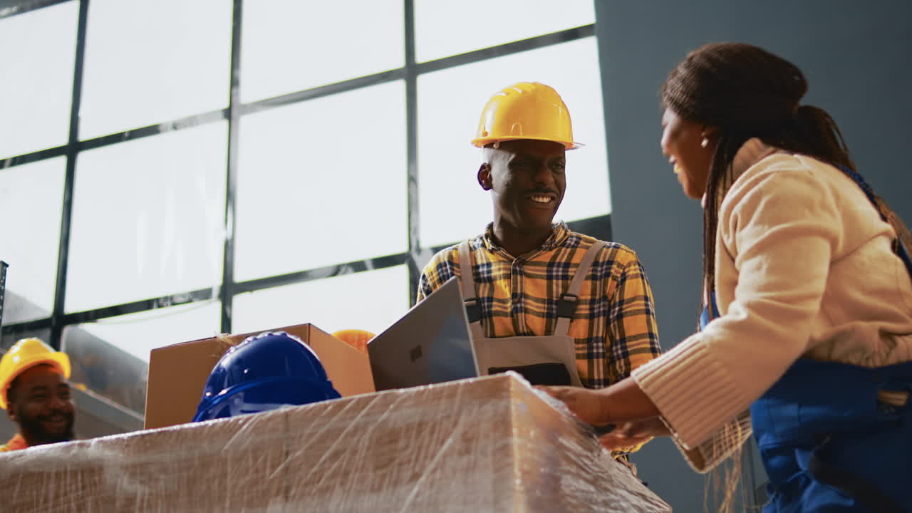 Warehouse workers collaborating on logistics