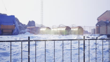 winter construction site with snow and equipment in a remote location