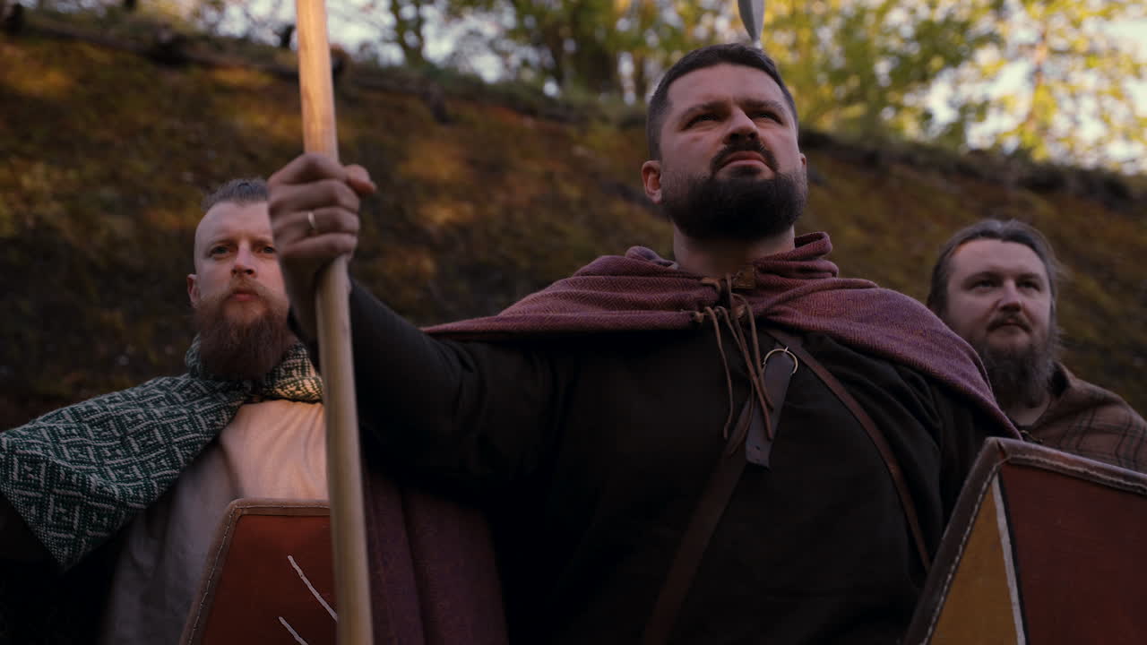 Vikings Posing with Spears and Shields