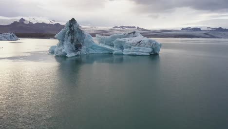 a drone footage of an iceberg in jokusarlon glacier lagoon