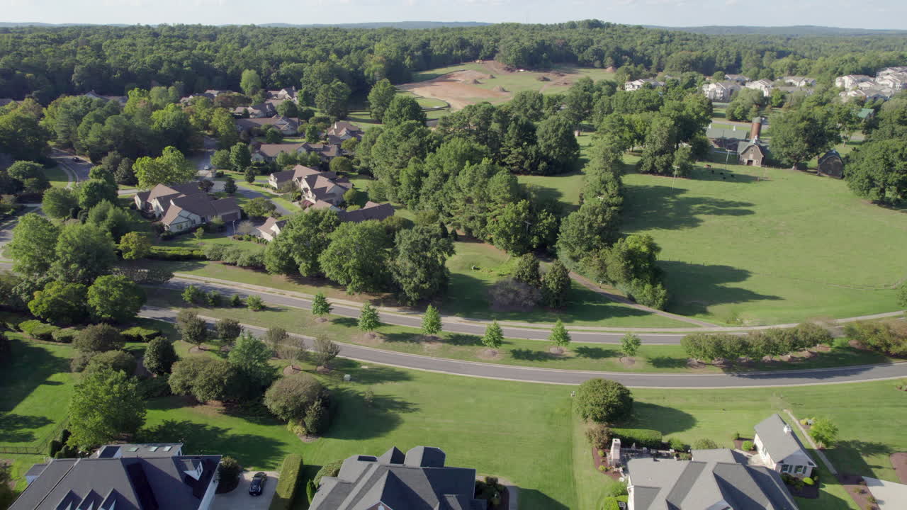 Beautiful, suburbs with stunning houses and landscaped yards, drone