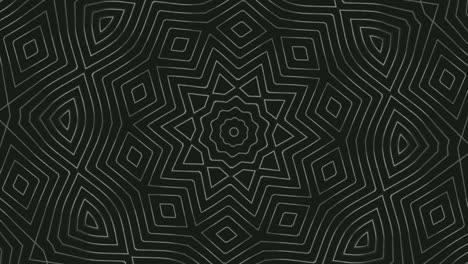 geometric star pattern rotating on black background, graphic