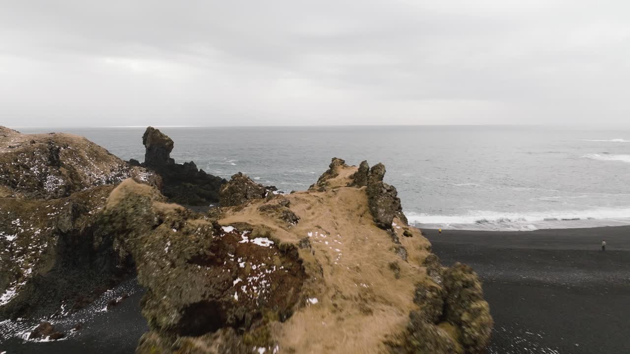 flying above the rocks at the Djúpalónssandur, Iceland
