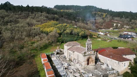 aerial orbit establishes santa maria de punxin in ourense galicia spain with cemetery grounds