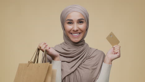 happy woman shopping with credit card