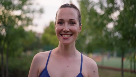 smiling woman in a park