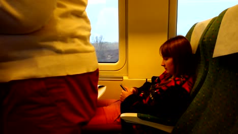 the girl in the railway carriage of the high-speed train.