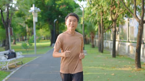 senior man running in park