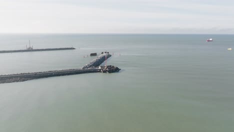 panoramic view of the northern and southern piers or harbor gates that connect the baltic sea and the curonian lagoon