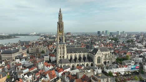 aerial approaching shot showing cathedral of our lady in antwerp city