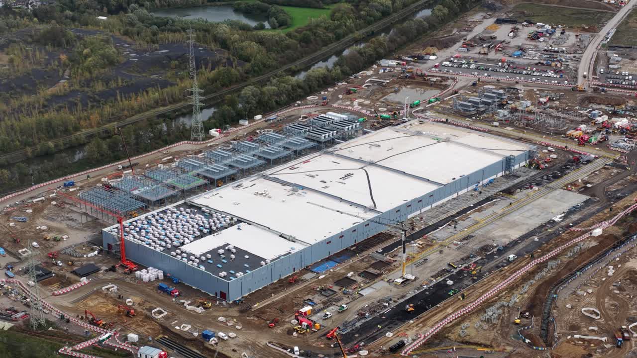 New constructed data center in Farciennes, investment of 1 billion euros, AI and artificial intelligience infrastructure. Aerial video