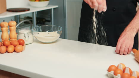 baker spreading cookies ingredient