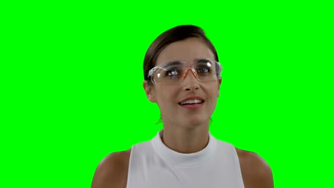 businesswoman wearing futuristic eyewear while using digital screen