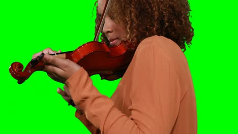 Close-up-of-female-musician-playing-violin