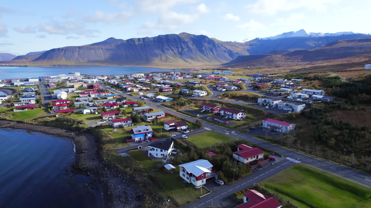 Grundarfj&ouml;r&eth;ur picturesque town at volcanic Mount Kirkjufell foothills
