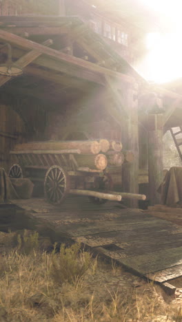 rustic wooden cart with logs in old barn